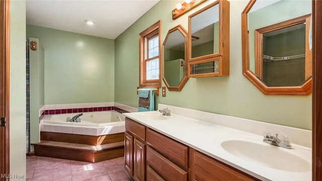 9910 Matchett Rd, Norwich, OH 43767 - bathroom with a garden tub, double vanity, and tile patterned flooring