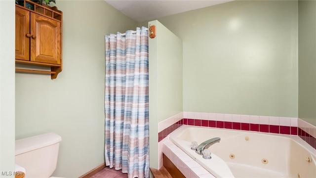9910 Matchett Rd, Norwich, OH 43767 - bathroom with a tub with jets and toilet