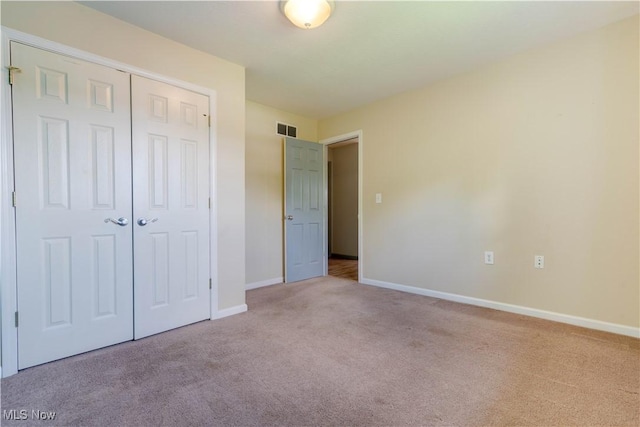 1104 4th St, Belpre, OH 45714 - unfurnished bedroom featuring carpet floors and a closet