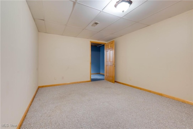 1104 4th St, Belpre, OH 45714 - spare room with light colored carpet and a drop ceiling