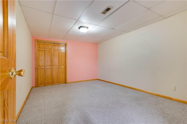 1104 4th St, Belpre, OH 45714 - unfurnished bedroom featuring a paneled ceiling, carpet flooring, and a closet