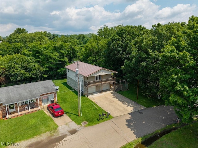 1104 4th St, Belpre, OH 45714 - view from above of property featuring a forest