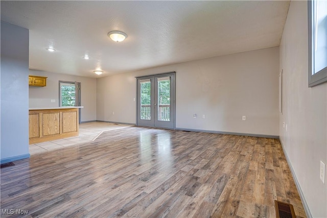 1104 4th St, Belpre, OH 45714 - empty room with light wood-type flooring