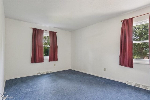 240 S Park Dr, Aurora, OH 44202 - empty room with dark carpet and baseboards