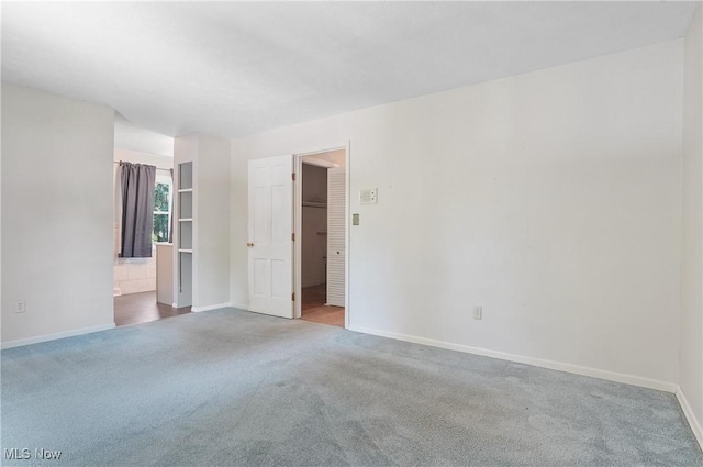 240 S Park Dr, Aurora, OH 44202 - carpeted spare room featuring baseboards