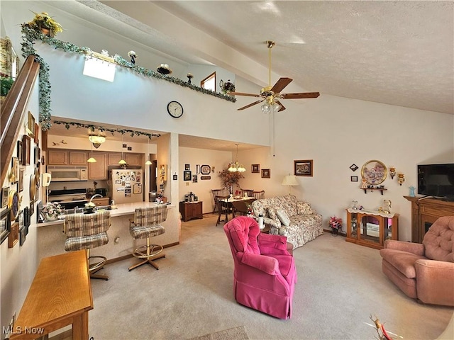 3308 Trappers Trl Unit A, Cortland, OH 44410 - living area featuring light carpet, ceiling fan, and high vaulted ceiling