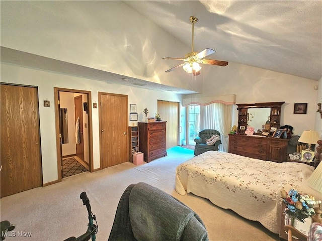 3308 Trappers Trl Unit A, Cortland, OH 44410 - carpeted bedroom with high vaulted ceiling, two closets, and a ceiling fan