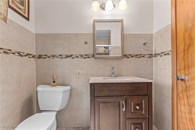 2637 Carmen Dr, Rocky River, OH 44116 - bathroom featuring tile walls and vanity