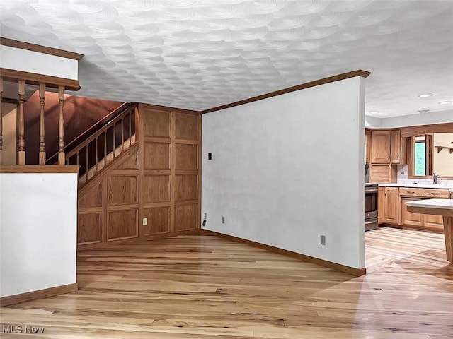1027 Twp Rd Unit 1806, Ashland, OH 44805 - unfurnished living room with light wood finished floors, stairs, and recessed lighting