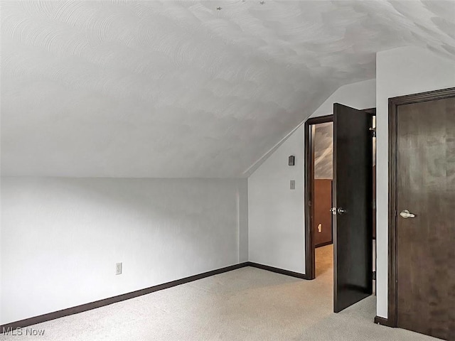 1027 Twp Rd Unit 1806, Ashland, OH 44805 - bonus room featuring lofted ceiling and light colored carpet