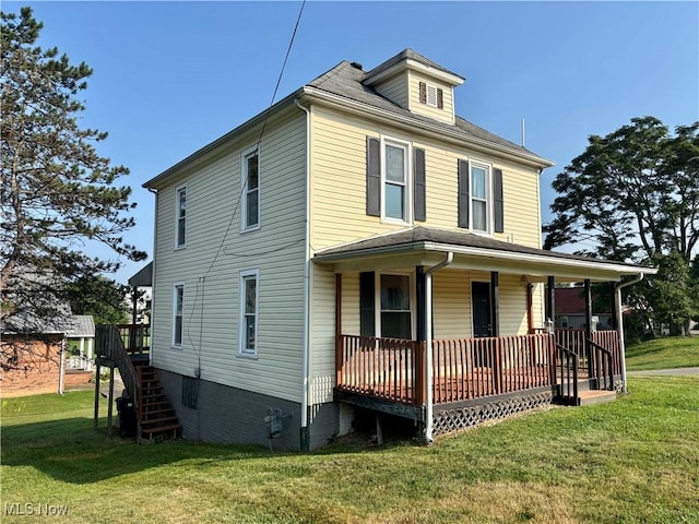 1021 12th Ave, Vienna, WV 26105 - traditional style home featuring a porch, a front yard, and stairway