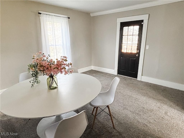 1021 12th Ave, Vienna, WV 26105 - dining room with healthy amount of natural light, carpet flooring, and ornamental molding