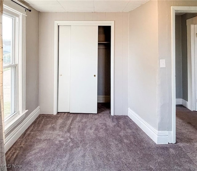 1021 12th Ave, Vienna, WV 26105 - unfurnished bedroom with carpet and a closet