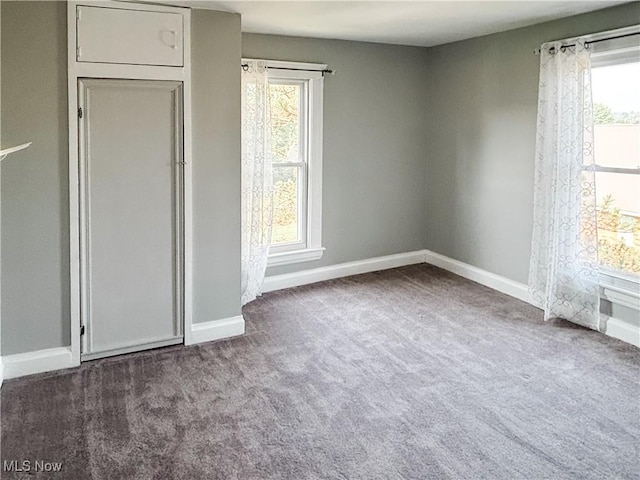 1021 12th Ave, Vienna, WV 26105 - unfurnished bedroom featuring carpet floors and baseboards