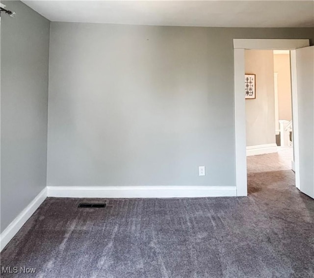 1021 12th Ave, Vienna, WV 26105 - unfurnished room featuring carpet floors and baseboards