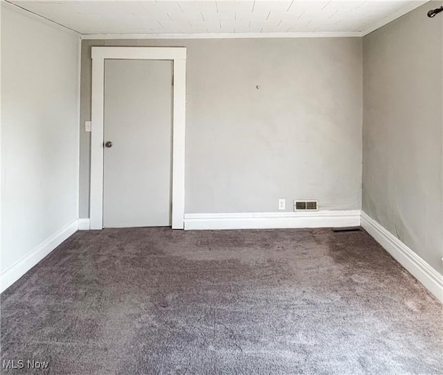 1021 12th Ave, Vienna, WV 26105 - carpeted empty room with crown molding and baseboards