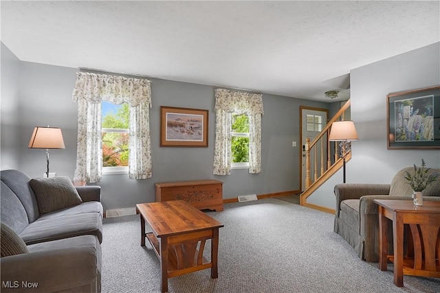 4190 Springdale Rd, Stow, OH 44224 - carpeted living room with stairway and baseboards