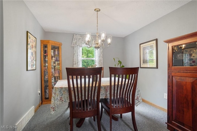 4190 Springdale Rd, Stow, OH 44224 - carpeted dining room featuring a chandelier and baseboards