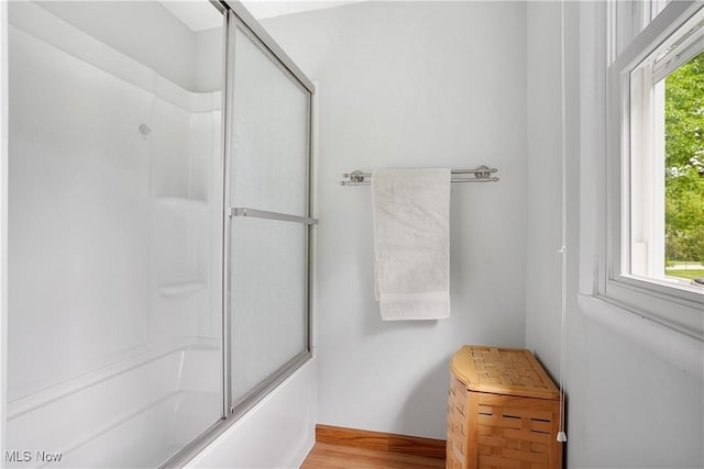 4190 Springdale Rd, Stow, OH 44224 - bathroom featuring wood finished floors and bath / shower combo with glass door