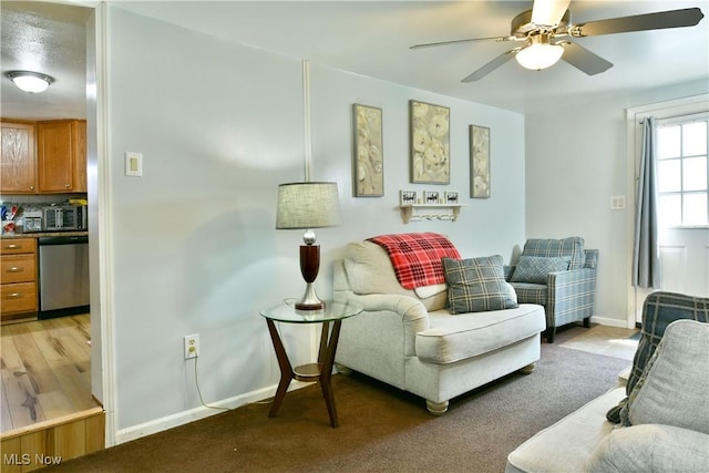 252 E Main St, Newton Falls, OH 44444 - living room featuring a ceiling fan and baseboards