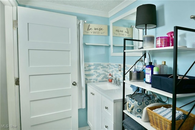 252 E Main St, Newton Falls, OH 44444 - bathroom featuring vanity, decorative backsplash, crown molding, and a textured ceiling