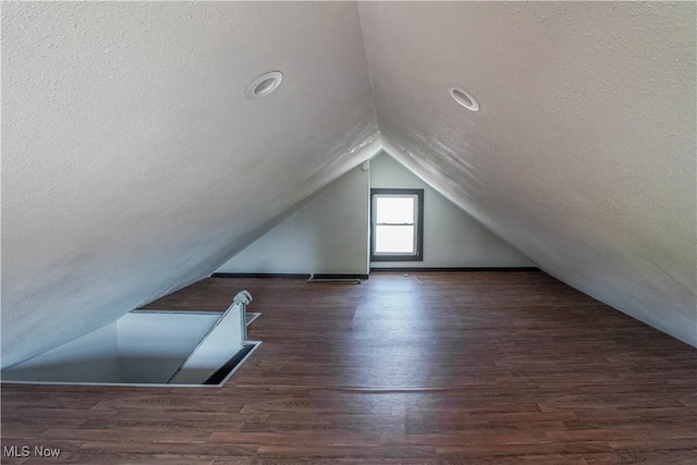 1384 Stark Ave SW, Canton, OH 44706 - bonus room featuring vaulted ceiling, a textured ceiling, wood finished floors, and recessed lighting