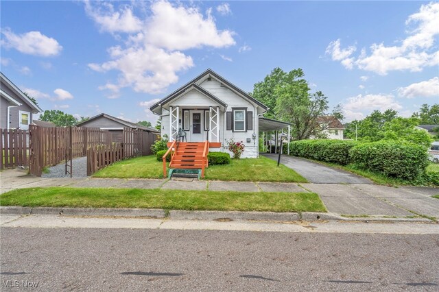 654 Van Everett Ave, Akron, OH 44306 - view of front of home with asphalt driveway and a carport