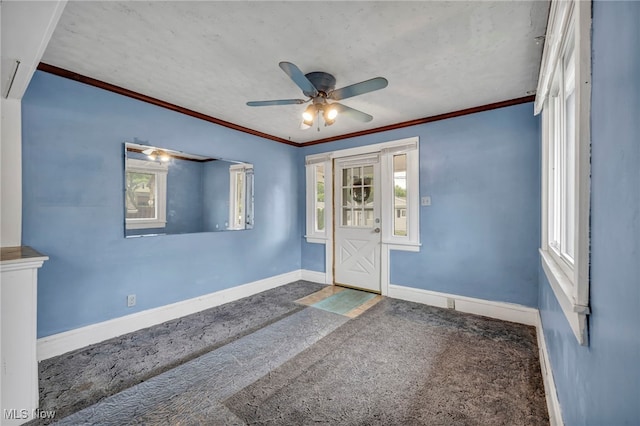 654 Van Everett Ave, Akron, OH 44306 - carpeted entryway featuring a ceiling fan and crown molding