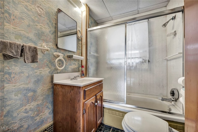 654 Van Everett Ave, Akron, OH 44306 - bathroom with vanity, shower / bath combination with glass door, tile patterned floors, and wallpapered walls