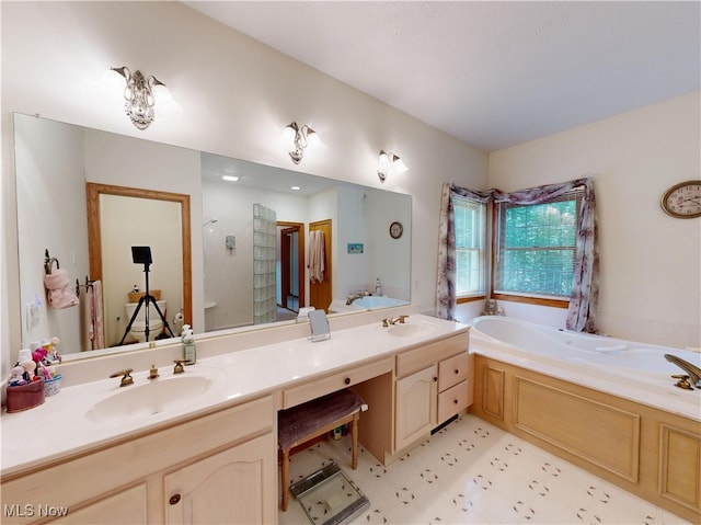 35005 Lisle Ct, Willoughby, OH 44094 - bathroom with a garden tub, tiled shower, and double vanity