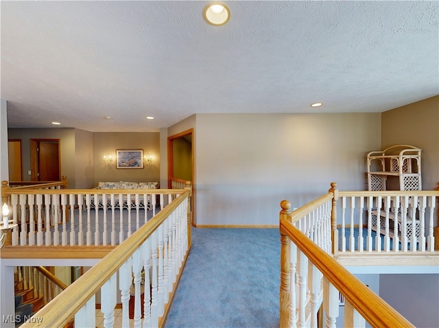 35005 Lisle Ct, Willoughby, OH 44094 - hallway with an upstairs landing, carpet floors, recessed lighting, and a textured ceiling