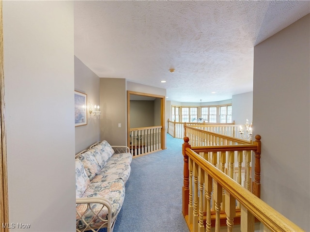 35005 Lisle Ct, Willoughby, OH 44094 - hallway featuring an upstairs landing, carpet floors, a textured ceiling, and recessed lighting
