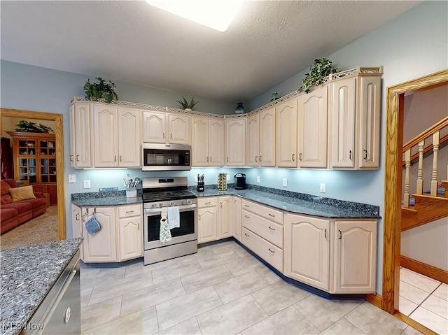 35005 Lisle Ct, Willoughby, OH 44094 - kitchen featuring stainless steel appliances and light tile patterned floors