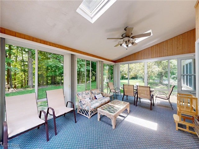 35005 Lisle Ct, Willoughby, OH 44094 - sunroom featuring a skylight, vaulted ceiling, a ceiling fan, and outdoor dining space