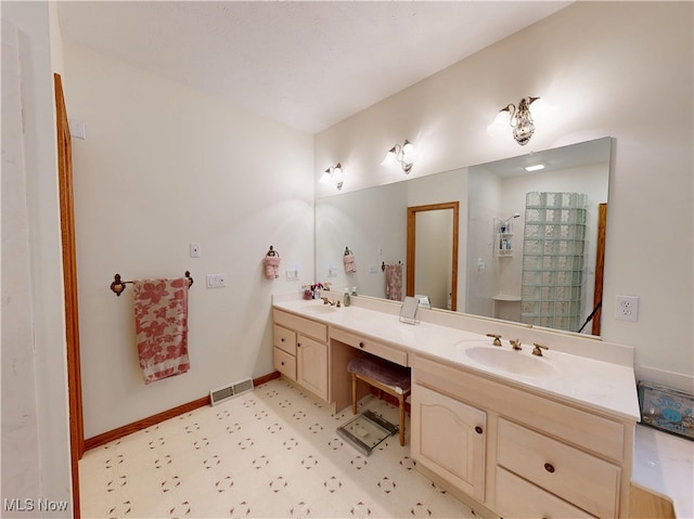 35005 Lisle Ct, Willoughby, OH 44094 - full bath featuring double vanity, a shower, and tile patterned floors