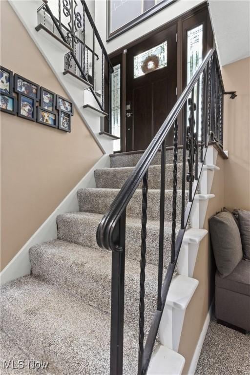 3247 Brooklawn Dr, Norton, OH 44203 - staircase with carpet and baseboards