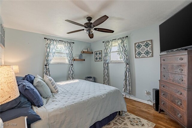 2880 Hetzel Dr, Parma, OH 44134 - bedroom featuring wood finished floors and a ceiling fan