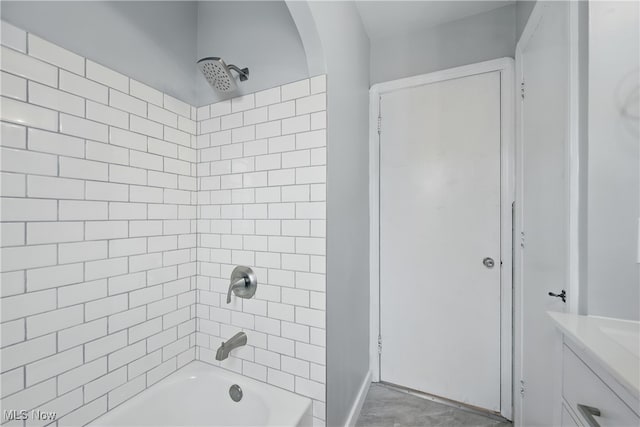 10212 Grace Ave, Garfield Heights, OH 44125 - bathroom featuring shower / tub combination and vanity