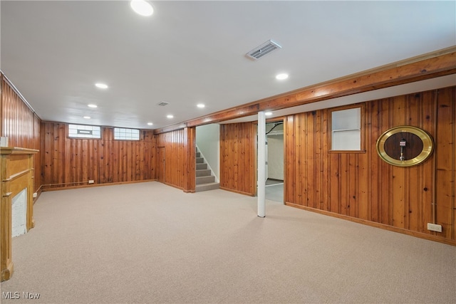 10212 Grace Ave, Garfield Heights, OH 44125 - basement with wood walls, stairs, recessed lighting, and light colored carpet
