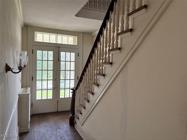 989 Orchard Hill Cir, Massillon, OH 44646 - foyer entrance featuring stairs, plenty of natural light, wood-type flooring, and french doors