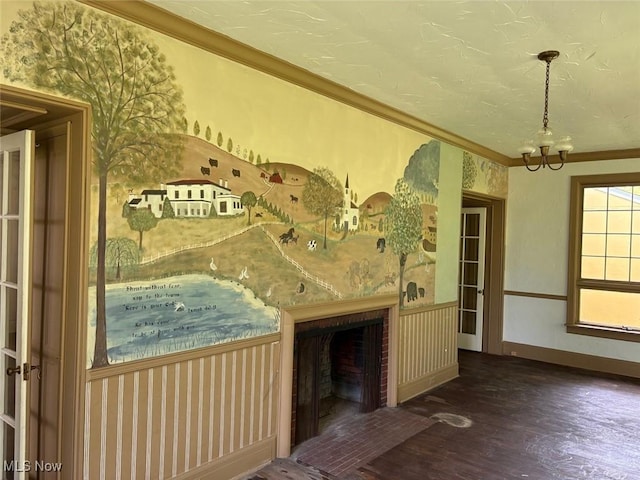 989 Orchard Hill Cir, Massillon, OH 44646 - interior space with a chandelier, wood finished floors, a fireplace, and crown molding