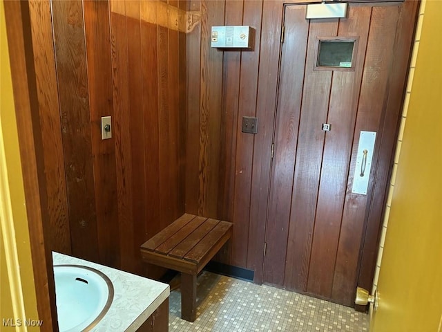 989 Orchard Hill Cir, Massillon, OH 44646 - bathroom with wood walls and vanity