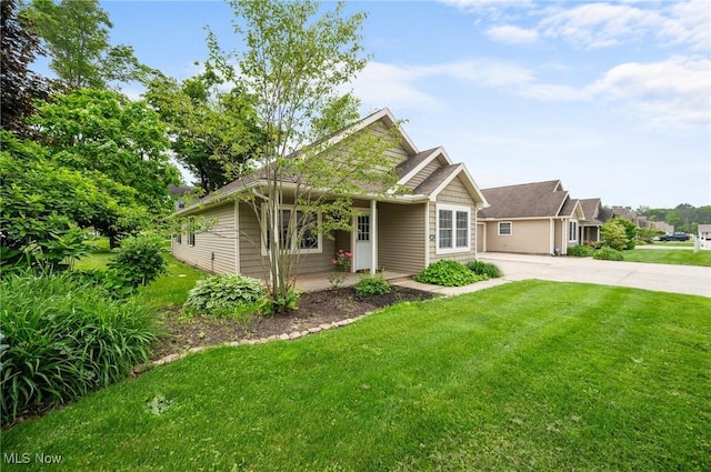 3031 Logan Ln Unit 1, Rock Creek, OH 44084 - view of front of property featuring a front lawn and driveway