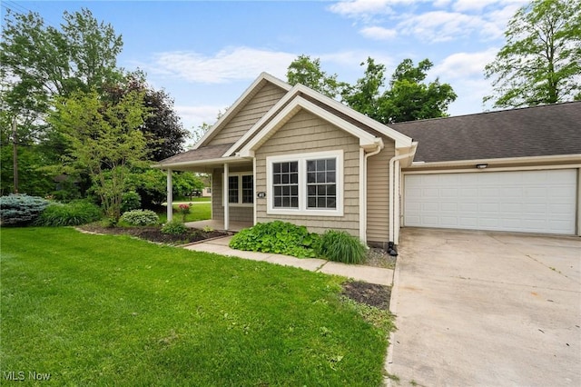 3031 Logan Ln Unit 1, Rock Creek, OH 44084 - ranch-style home featuring driveway, a front yard, and a garage