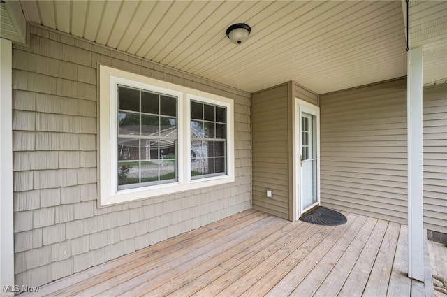 3031 Logan Ln Unit 1, Rock Creek, OH 44084 - view of wooden deck