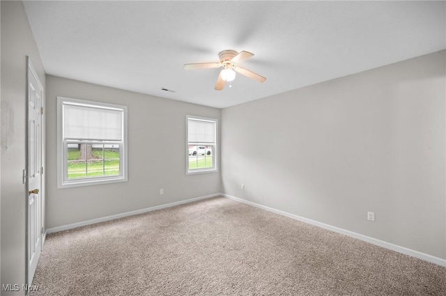 3031 Logan Ln Unit 1, Rock Creek, OH 44084 - carpeted empty room with ceiling fan and baseboards