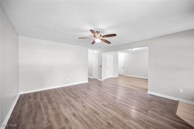 3031 Logan Ln Unit 1, Rock Creek, OH 44084 - spare room featuring a ceiling fan and wood finished floors