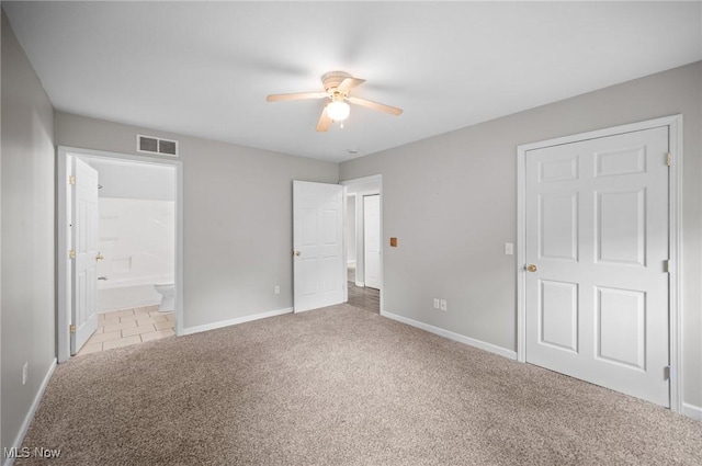 3031 Logan Ln Unit 1, Rock Creek, OH 44084 - unfurnished bedroom with carpet, ensuite bathroom, and a ceiling fan