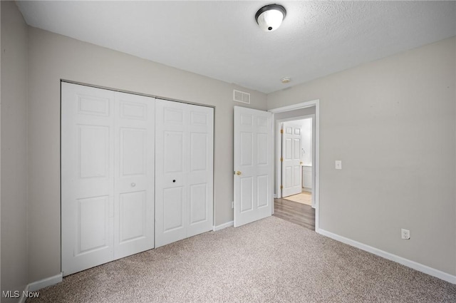 3031 Logan Ln Unit 1, Rock Creek, OH 44084 - unfurnished bedroom with carpet flooring and a closet