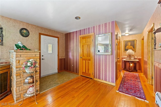 3612 Ridge Rd, Cortland, OH 44410 - entryway with wallpapered walls, hardwood / wood-style flooring, and baseboard heating